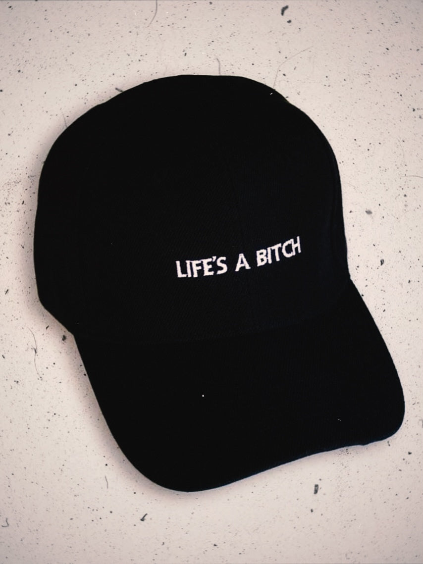 GORRA LIFES A BITCH