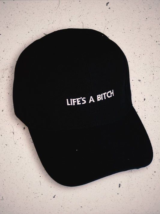 GORRA LIFES A BITCH